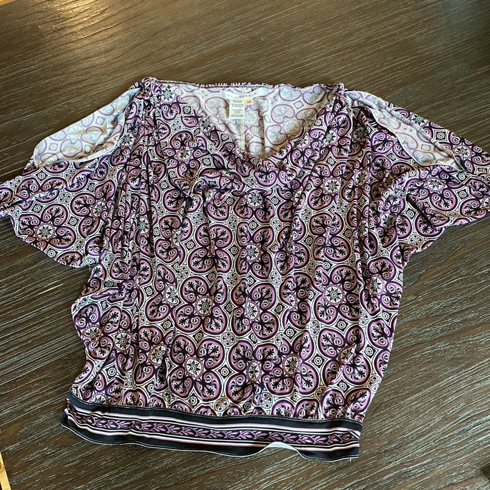 Max studio ladies blouse in size extra small with unique cold shoulder look.
